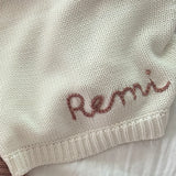 Hand-embroidered baby blanket in snow