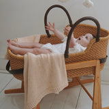 Hand-embroidered baby blanket in sand